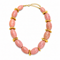 Pink gemstone necklace with gold accents.