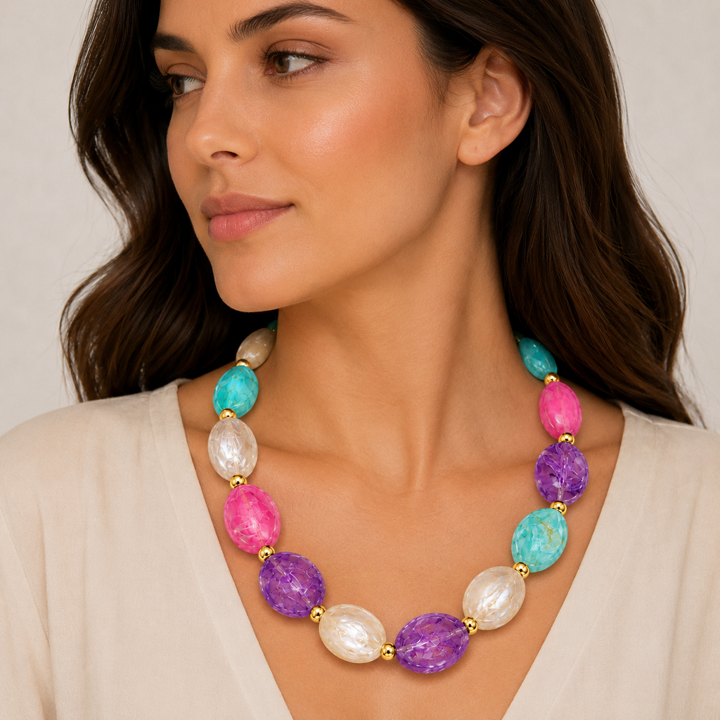 Colorful gemstone necklace with gold accents.
